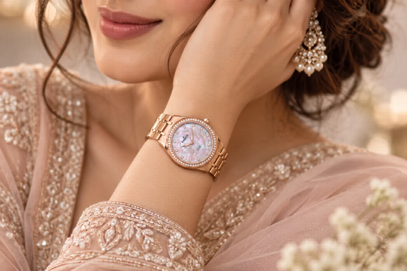 Woman wearing a rose-gold Fabius watch